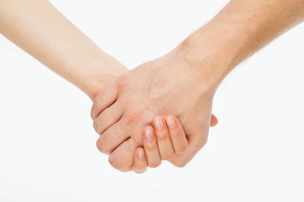 dos manos sujetándose mejora terapia y acompañamiento psicológico